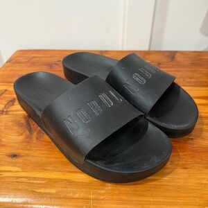 NOBULL Black Embossed Logo Cushioned Contoured Footbed Slide Sandals Nobull Slides Sandals Black Green Men main image 2